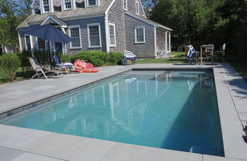 West of Town House | Stunning home- heated pool, spa, firepit, privte acre, walk or free bus to town