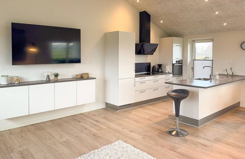 Skaven Strand House | Stunning home in Tarm with lake view