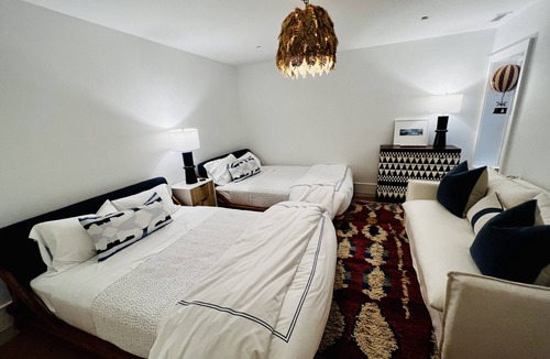 West of Town House | Stunning In-Town New Construction with Designer Interiors, Private Pool, Gym