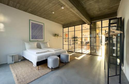 Amager Apartment | Stunning Industrial-Style Loft by the Canals