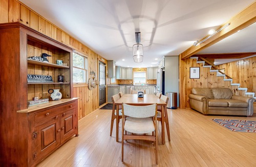 Pine River Pond House | Stunning lakefront home with private dock, deck, firepit, and lake view