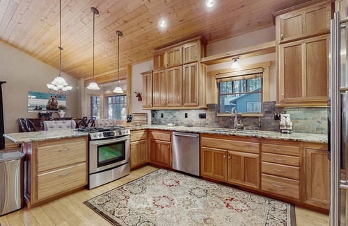 Sierra Tract House | Stunning Large Custom Family Home with Fireplace, Yard, Spa, Views, EV Car Charger