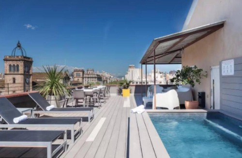 El Raval Apartment | Stunning Light-Filled Apartment with Rooftop Pool in Central Barcelona