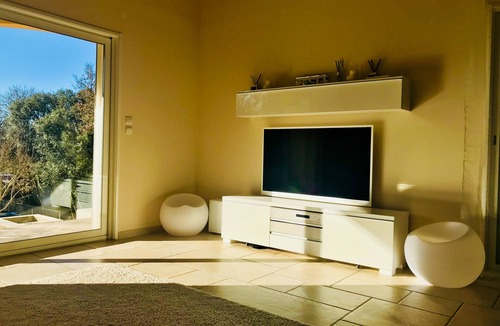 Sardan Villa | Stunning Mediterranean Villa with Waterfall Swimming pool a large garden.