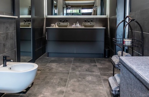 Iron Acton House | Stunning Modern Barn sleep 24 with Hot Tub , Cinema Room and Games Room .