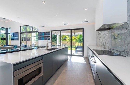 Poinsettia Heights House | Stunning Modern Luxury in Fort Lauderdale w Heated Pool & Spa, Minutes to Beach