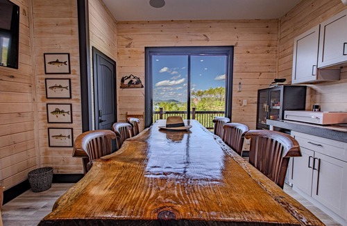 Sevierville Cabin | Stunning Mtn Lodge on Lake with two Story Dock, Indoor Pool, Arcade,and Hot Tub.