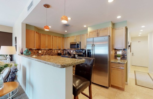 Central Beach Condo | Stunning ocean-facing condo with intercoastal views & balcony -1 block to beach