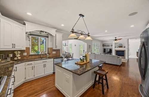 Overland Park House | Stunning private villa pond, theater