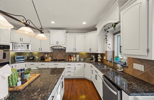 Overland Park House | Stunning private villa pond, theater