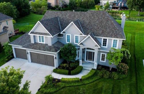 Overland Park House | Stunning private villa pond theater