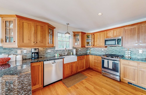 Westport House | Stunning riverfront gem with private dock, gourmet kitchen, and firepit