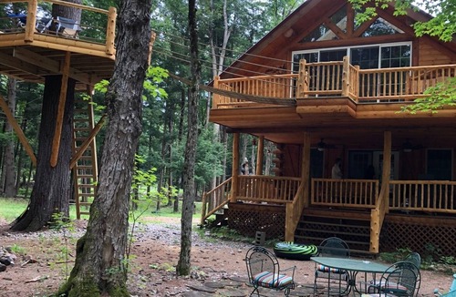 Glenfield Cabin | Stunning Riverfront Solar-Powered Cabin with back-up generator