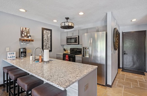 Osage Beach Condo | Stunning Views, Inviting Pools, and Endless Fun!