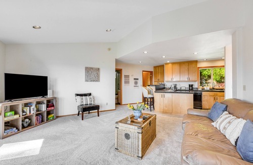 Oak Harbor House | Stunningly situated home with expansive deck & mountain/water views