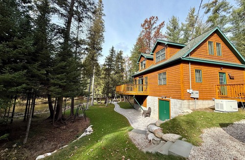Cheboygan County Cabin | Sturgeon Riverfront Cedar Cabin
