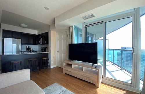 Central Waterfront Apartment | Stylish 1 Bedroom Condo with Unobstructed CN Tower View