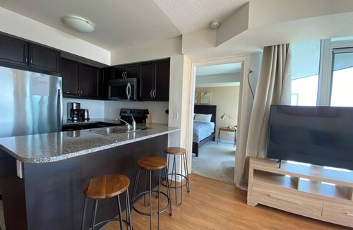 Central Waterfront Apartment | Stylish 1 Bedroom Condo with Unobstructed CN Tower View