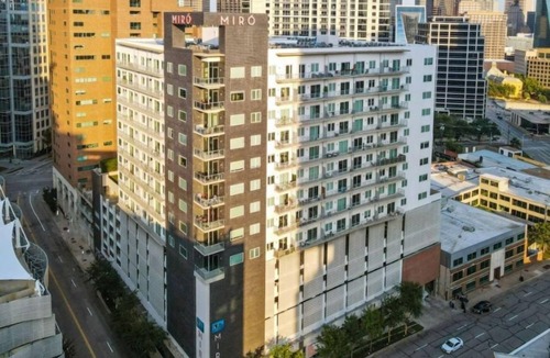Uptown Condo | Stylish 1BR at Miro – Rooftop Pool and Fire Pit!