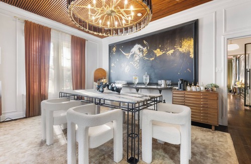 Peak's Suburban Addition Condo | Stylish 1BR furnished condo in Central Dallas featuring a high-end kitchen, king bed, 65” smart TV, and access to an award-winning courtyard retreat.
