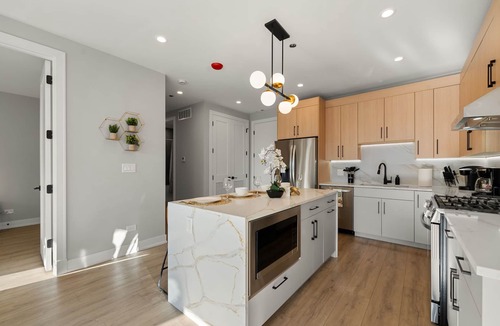 Tri-Taylor Apartment | Stylish 2-Bedroom Retreat with Parking and Balcony