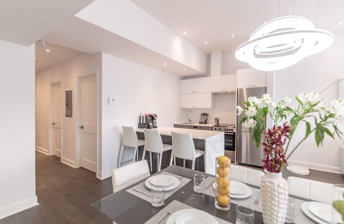 Mile End Condo | Stylish 4-Bedroom Condo with Private Deck & Hot Tub!