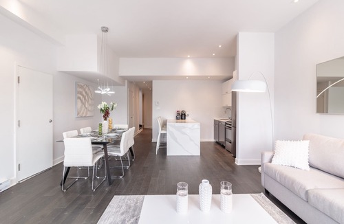 Mile End Condo | Stylish 4-Bedroom Condo with Private Deck & Hot Tub!