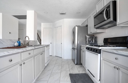 Clodine House | Stylish 4br 2.5ba Haven In Houston 4 Bedroom Home by RedAwning