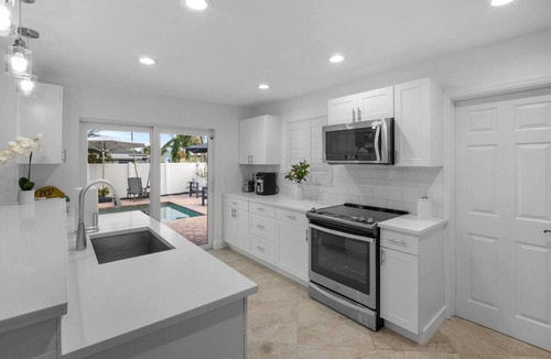 Garden Isles House | Stylish 4BR Oasis | Heated Pool, Spa & Fire Pit