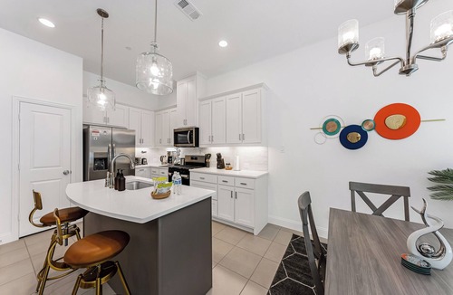 Lewisville House | Stylish Arcade Stay + EV Central