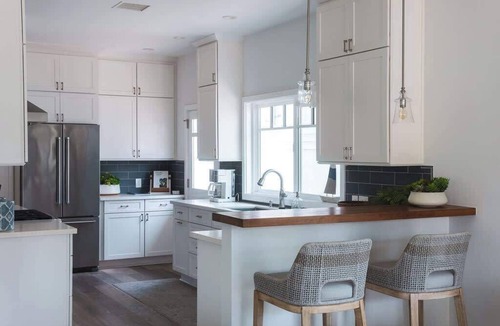 Naples House | Stylish Beach Cottage Steps from Naples Island