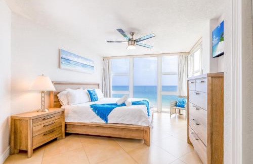 Galt Mile House | Stylish Beachfront Condo with Balcony & Ocean View