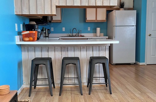 Sea Scape Condo | Stylish Coastal Retreat in the Heart of the OBX n2BR 2BA Pool Tennis Patio WiFi