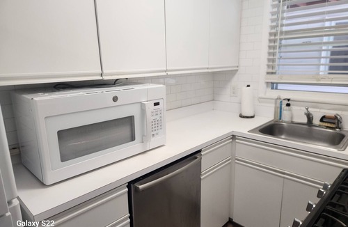Point Pleasant Condo | Stylish Coastal Condo Retreat. Bike to Beach & Dining. Complimentary Parking