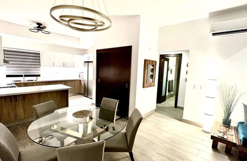 La Ceiba Apartment | Stylish Condo with TreeTops and Ocean Views