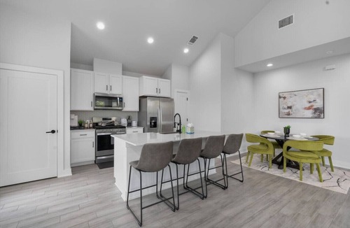 University Hills and Windsor Park Villa | Stylish Downtown Retreat w/Balcony, Reserved Parking + Walkable Access