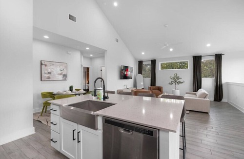 University Hills and Windsor Park Villa | Stylish Downtown Retreat w/Balcony, Reserved Parking + Walkable Access