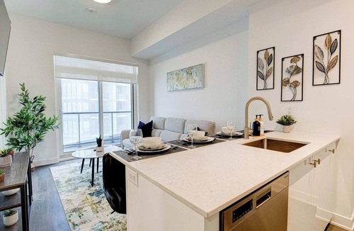 Kitchener Condo | Stylish Downtown Suite with Patio & City Views
