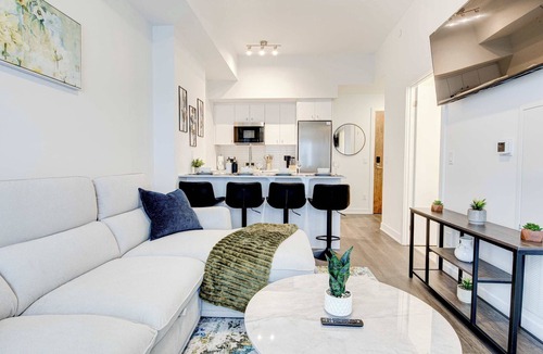 Kitchener Condo | Stylish Downtown Suite with Patio & City Views
