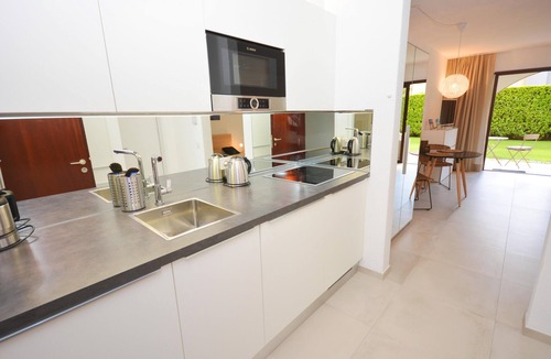 Ascona Apartment | Stylish garden apartment ideal for couples with outdoor pool and sunbathing area