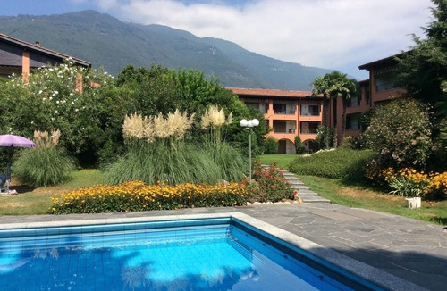 Ascona Apartment | Stylish garden apartment ideal for couples with outdoor pool and sunbathing area