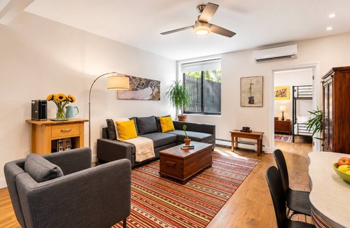East Harlem Apartment | Stylish Harlem Duplex with Private Patio Near Central Park