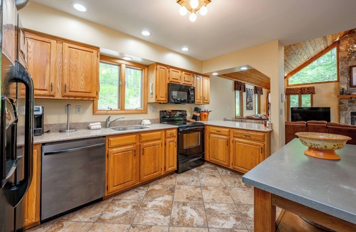 Oakland House | Stylish Lake Retreat w/Hot Tub, Dock & Fire Pit