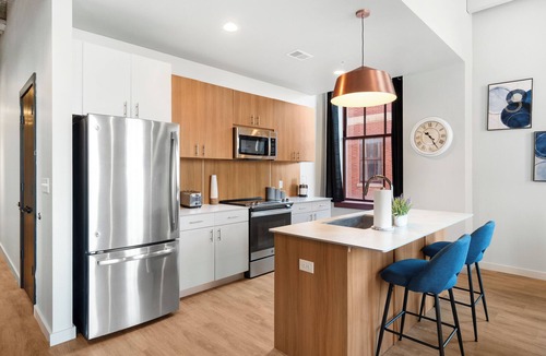 Midtown Apartment | Stylish Loft in St. Louis with Gym, Rooftop, Free Gated Parking, and Pool