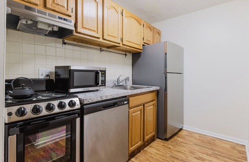 Mission Hill Apartment | Stylish Longwood studio, parking, elevator, w/d, by Blueground