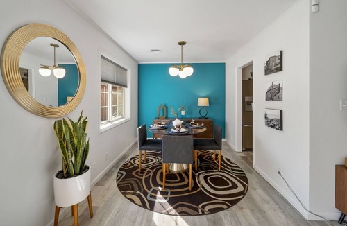 Mayo Meadow House | Stylish midcentury modern home in midtown. Luxury touches throughout.