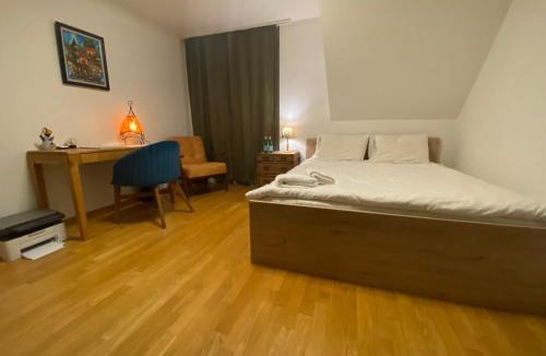 Zug House | Stylish Room and private bathroom in lakefront apartment