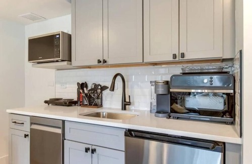 Jefferson Park Apartment | Stylish studio next to Mile High with kitchenette and large screen TV