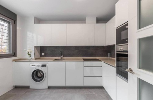 Pacifico Apartment | Stylish Three-Level Home with Patio and Garage in Central Madrid