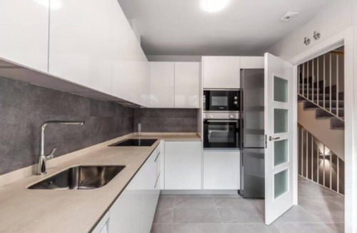 Pacifico Apartment | Stylish Three-Level Home with Patio and Garage in Central Madrid
